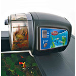 Automatic food dispenser for aquariums